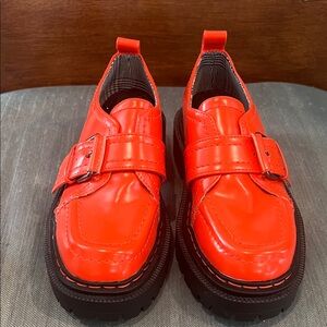 Vibrant orange Buckle Loafers circus ny